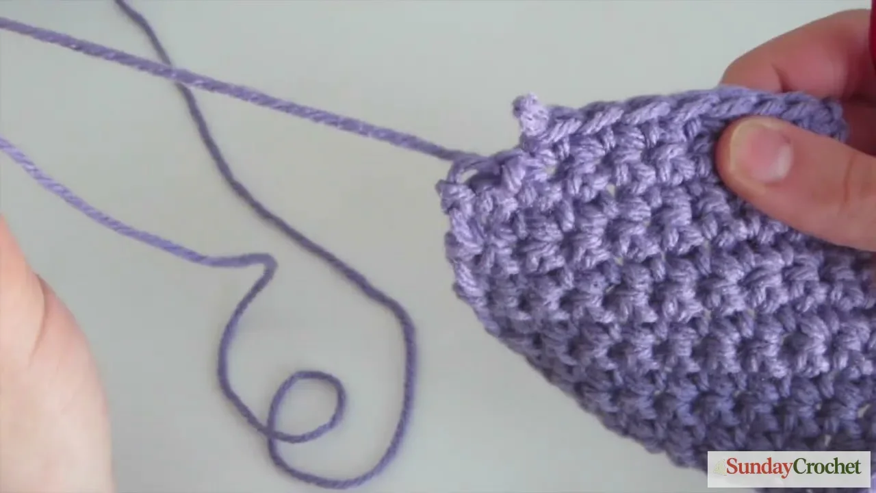 Undo crochet stitches by gently pulling the working yarn