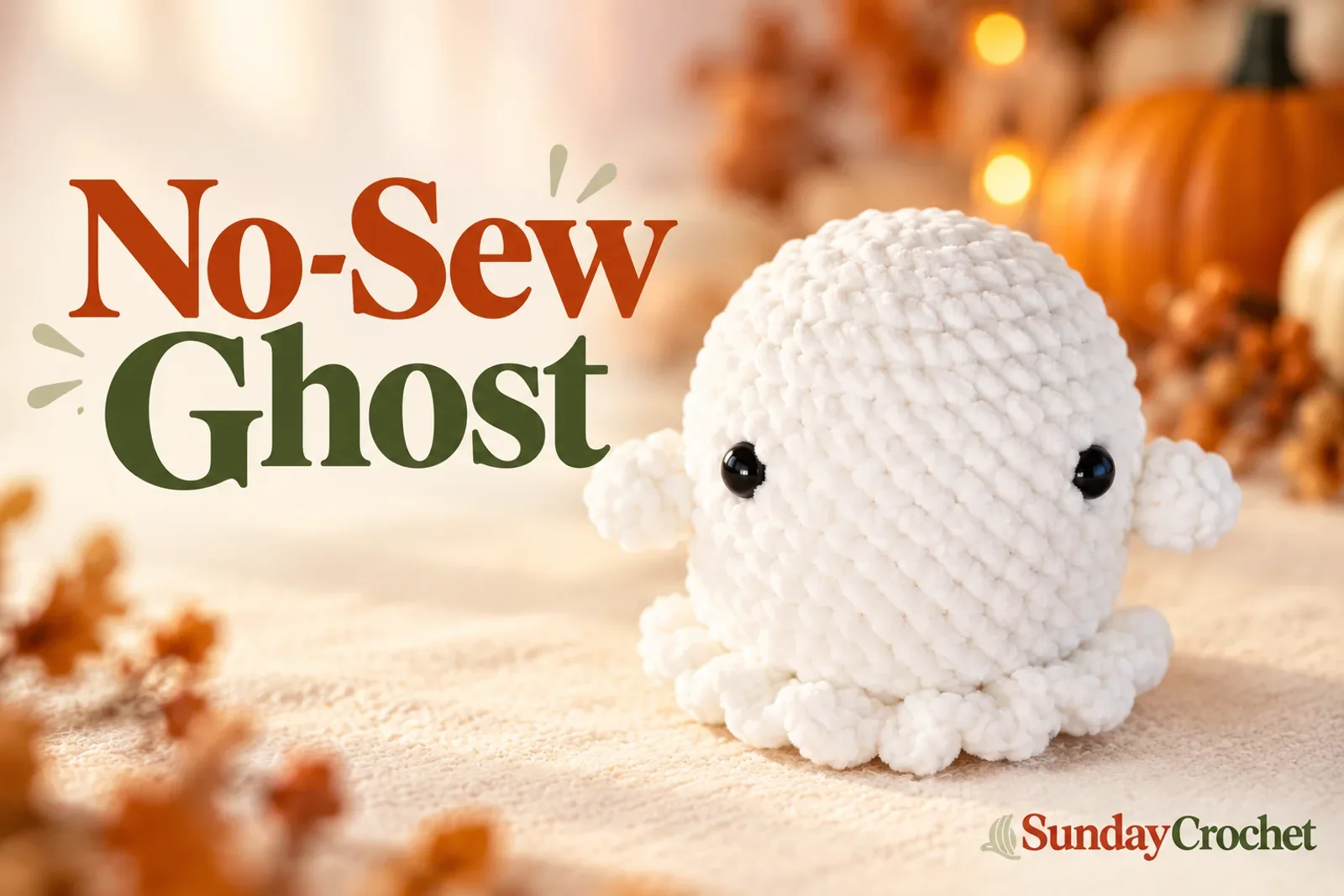 White plush crochet ghost with small arms, black eyes, and a ruffled hem